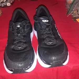 Black and white HOKA Shoes